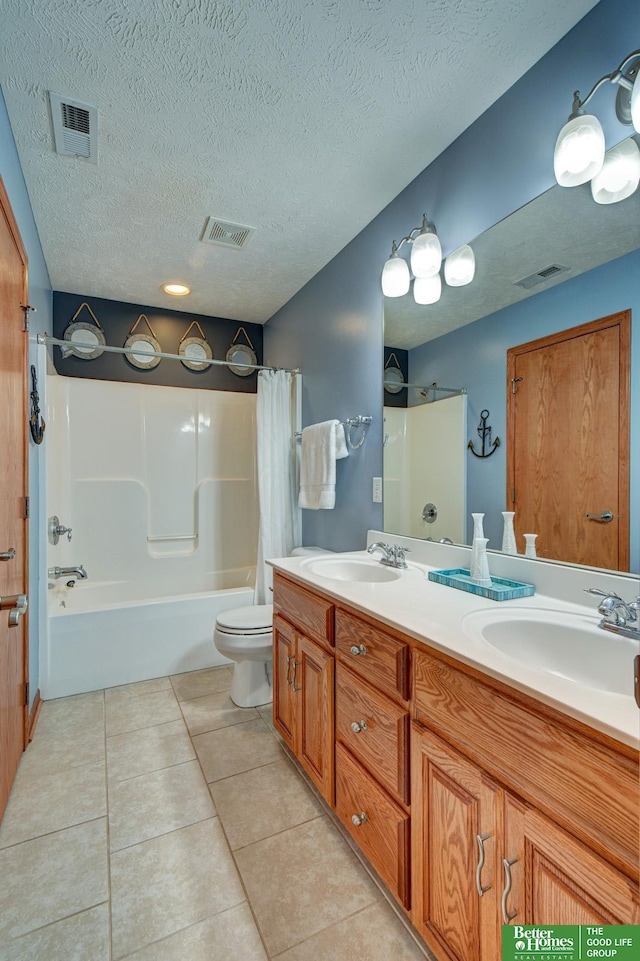 19311 Josephine St, Gretna, NE 68028 - full bath with shower / tub combo, double vanity, tile patterned floors, and a textured ceiling
