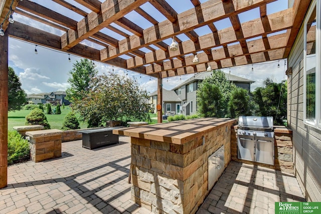 19311 Josephine St, Gretna, NE 68028 - view of patio with area for grilling, a fire pit, and a pergola