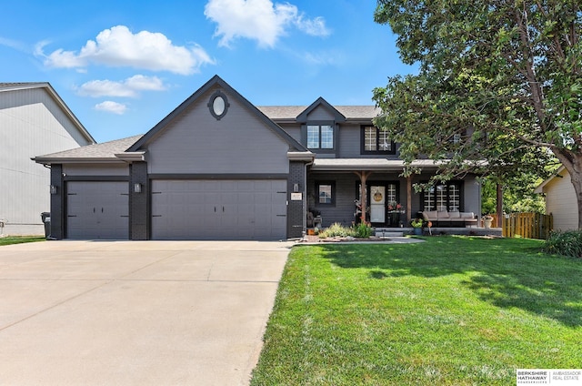 8127 S 105th St, La Vista, NE 68128 - view of front of property with a garage, covered porch, and concrete driveway