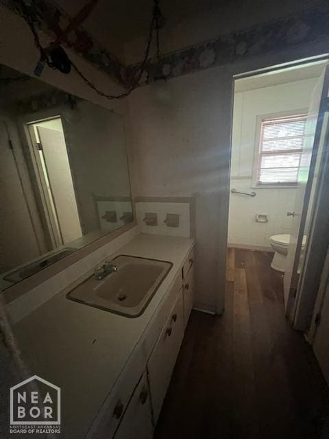 1508 N Easy St, Jonesboro, AR 72401 - bathroom featuring wood finished floors and vanity