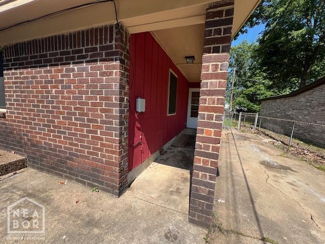 1508 N Easy St, Jonesboro, AR 72401 - view of side of home featuring brick siding