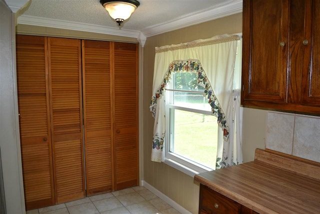 305 Concord, Jonesboro, AR 72401 - interior space featuring ornamental molding and light tile patterned floors