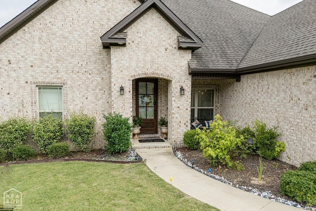 5301 Bridger Park Ct, Jonesboro, AR 72405 - entrance to property featuring a shingled roof and a lawn