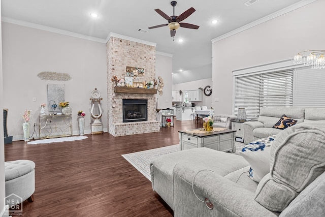 5301 Bridger Park Ct, Jonesboro, AR 72405 - living room featuring ceiling fan, crown molding, recessed lighting, a brick fireplace, and dark wood-style floors
