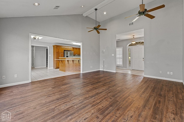 unfurnished living room featuring visible vents, light wood-type flooring, and ceiling fan