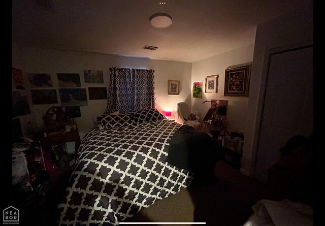 bedroom with visible vents