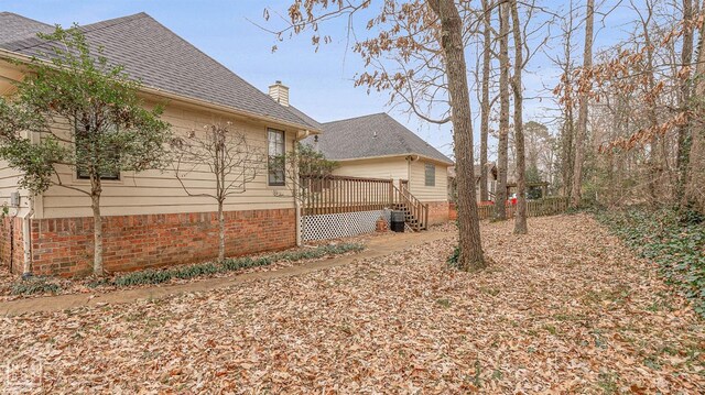 view of yard with a deck