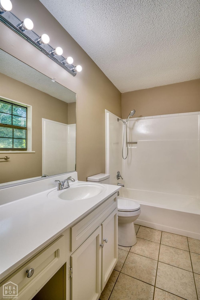 1610 Smoot Dr, Jonesboro, AR 72401 - bathroom with a textured ceiling, vanity, tile patterned flooring, and washtub / shower combination