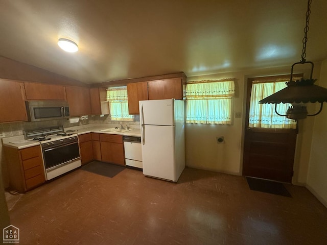209 W Easy St, Jonesboro, AR 72401 - kitchen with white appliances, a sink, light countertops, backsplash, and dark flooring