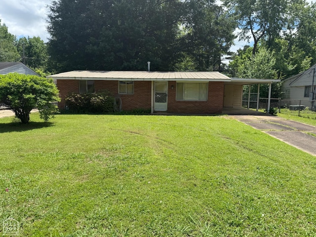 209 W Easy St, Jonesboro, AR 72401 - ranch-style house with driveway, a carport, and brick siding