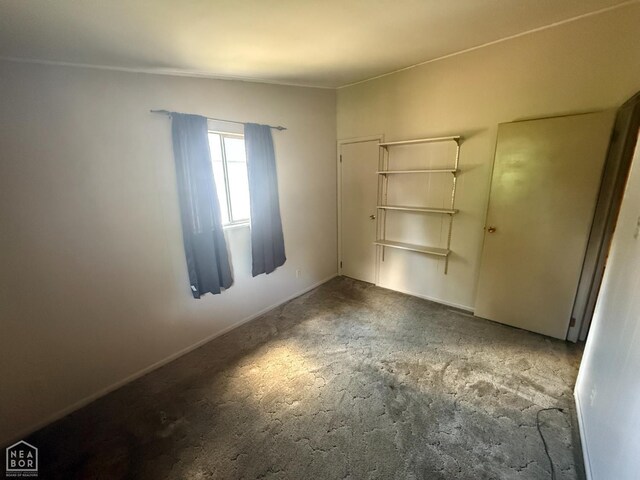 209 W Easy St, Jonesboro, AR 72401 - unfurnished bedroom with carpet floors