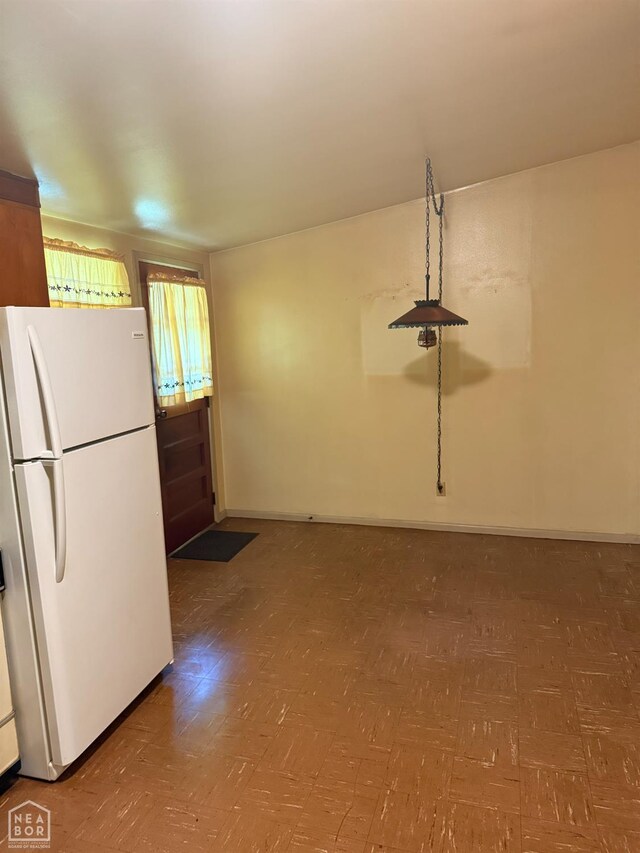 209 W Easy St, Jonesboro, AR 72401 - kitchen with freestanding refrigerator and baseboards