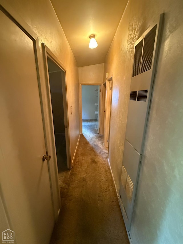209 W Easy St, Jonesboro, AR 72401 - corridor featuring a heating unit, carpet floors, and a textured wall