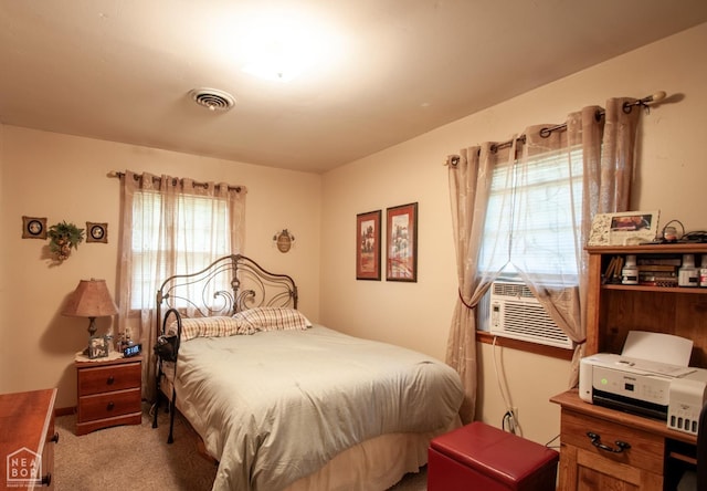 carpeted bedroom featuring cooling unit