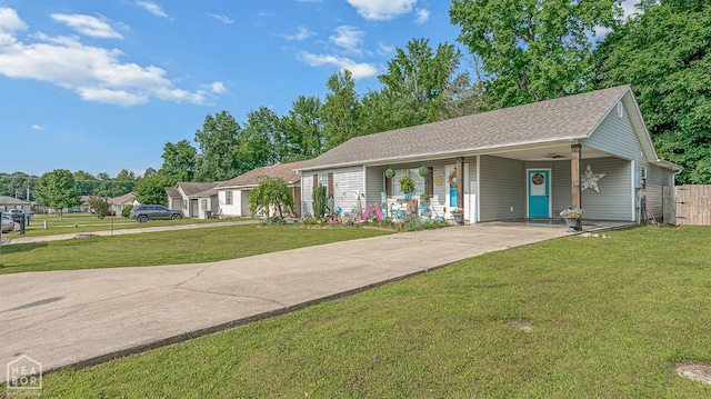 2708 N 5th St, Paragould, AR 72450 - ranch-style house featuring concrete driveway, an attached carport, a porch, and roof with shingles