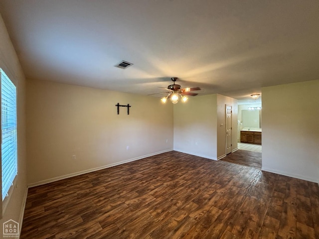 100 Charleston Dr, Walnut Ridge, AR 72476 - spare room featuring dark wood-type flooring and a ceiling fan