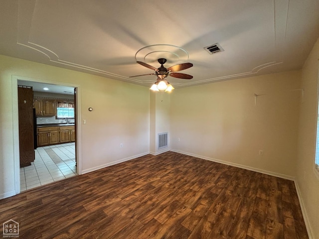 100 Charleston Dr, Walnut Ridge, AR 72476 - spare room featuring wood finished floors and a ceiling fan