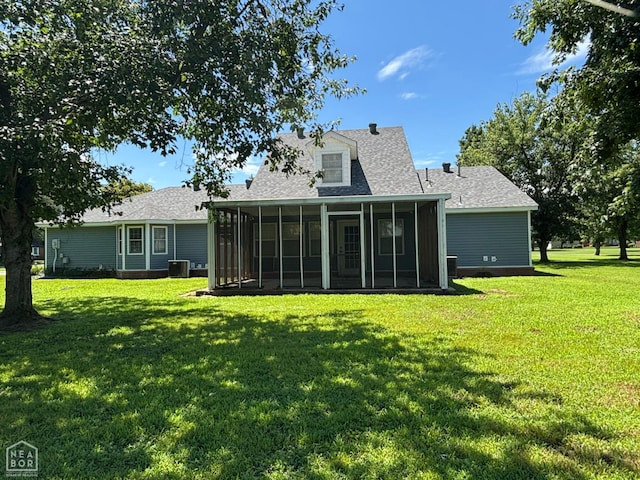 100 Charleston Dr, Walnut Ridge, AR 72476 - rear view of property with a sunroom, a lawn, and roof with shingles