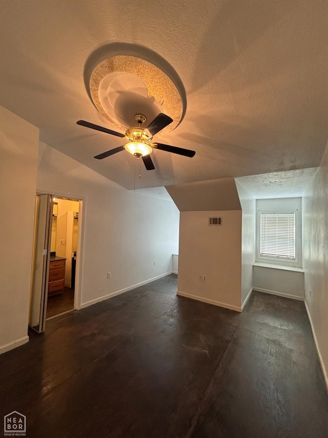 100 Charleston Dr, Walnut Ridge, AR 72476 - additional living space with lofted ceiling, a textured ceiling, and ceiling fan