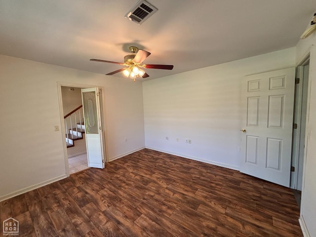 100 Charleston Dr, Walnut Ridge, AR 72476 - unfurnished room with a ceiling fan and dark wood-style floors