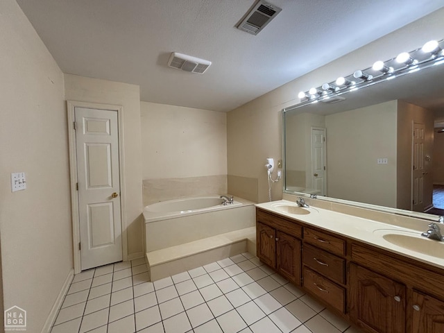 100 Charleston Dr, Walnut Ridge, AR 72476 - full bathroom featuring tile patterned floors, a garden tub, and double vanity