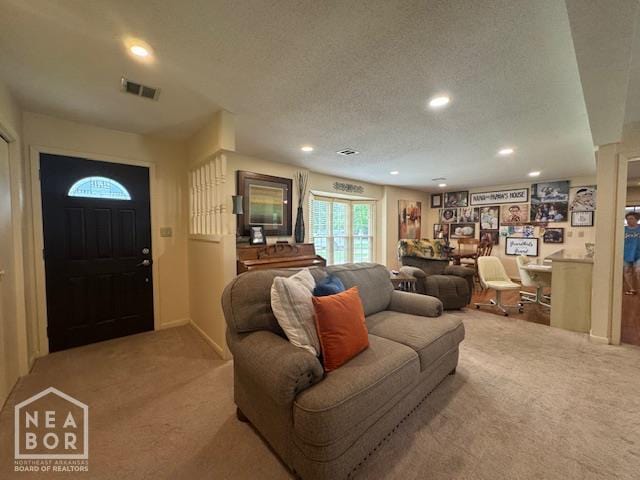 700 11th St, Corning, AR 72422 - living area featuring carpet flooring, recessed lighting, and a textured ceiling