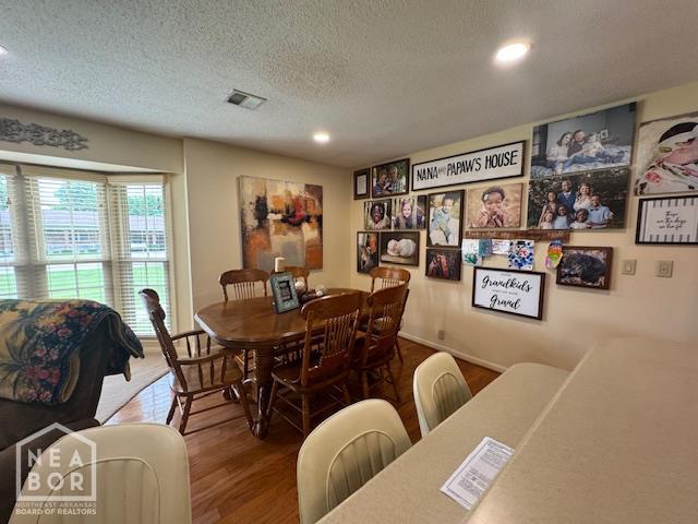700 11th St, Corning, AR 72422 - dining area with a textured ceiling, wood finished floors, and recessed lighting
