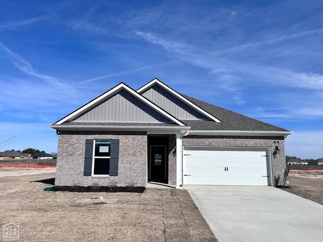 view of front of house featuring brick siding, roof with shingles, a garage, and concrete driveway