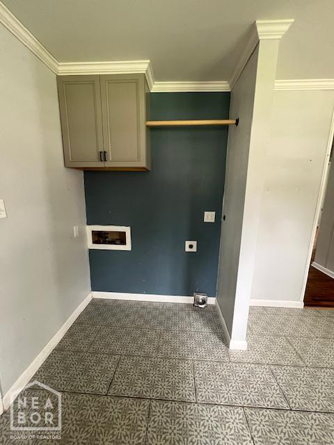 304 S 11th Ave S, Paragould, AR 72450 - laundry room with washer hookup, electric dryer hookup, crown molding, and tile patterned floors
