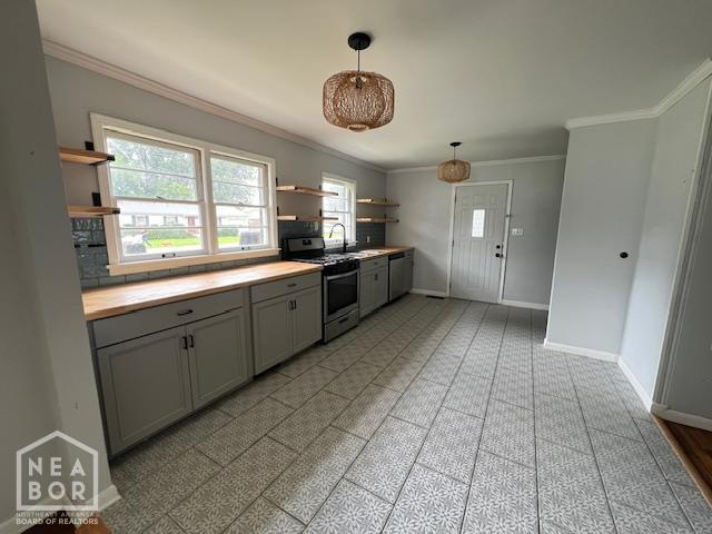 304 S 11th Ave S, Paragould, AR 72450 - kitchen featuring open shelves, appliances with stainless steel finishes, gray cabinets, light countertops, and crown molding