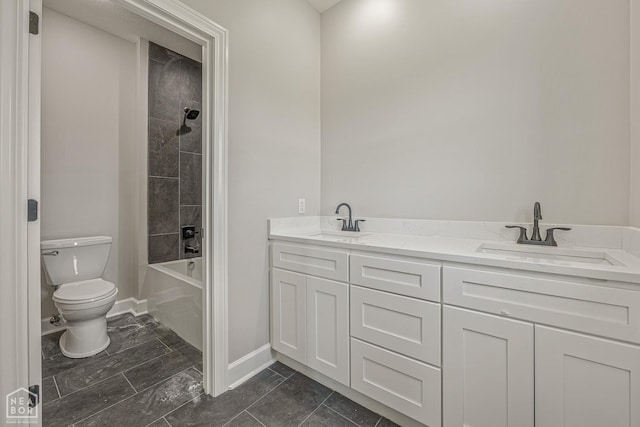 244 Quincy Cir, Trumann, AR 72472 - full bath with baseboards, marble finish floor, toilet, and a sink
