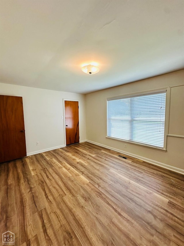 320 Church, Weiner, AR 72479 - interior space featuring baseboards, wood finished floors, and visible vents