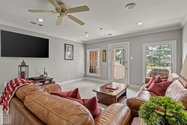 living room with baseboards, carpet floors, recessed lighting, ornamental molding, and a ceiling fan