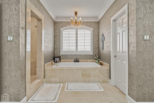 full bathroom with a chandelier, a garden tub, ornamental molding, a tile shower, and marble finish floors