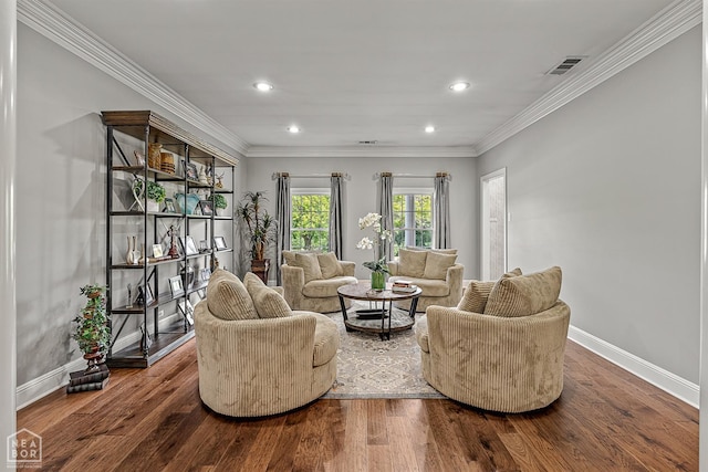 sitting room with recessed lighting, baseboards, wood finished floors, and crown molding