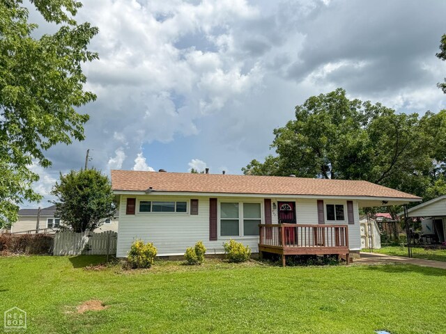 207 11th St, Marked Tree, AR 72365 - view of front of property with an attached carport and driveway