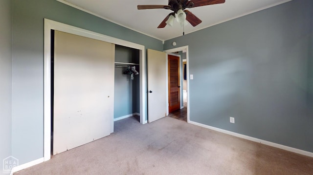 207 11th St, Marked Tree, AR 72365 - unfurnished bedroom with carpet flooring, a closet, ornamental molding, and ceiling fan