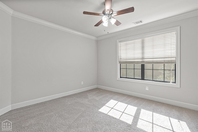 unfurnished room with crown molding, a ceiling fan, visible vents, light carpet, and baseboards