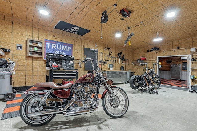 garage with a workshop area