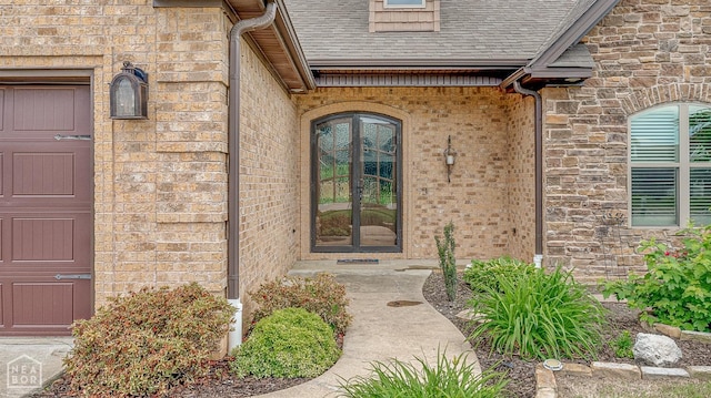 719 Smithfield Dr, Jonesboro, AR 72401 - property entrance with a shingled roof and brick siding
