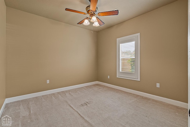 719 Smithfield Dr, Jonesboro, AR 72401 - spare room featuring carpet floors, a ceiling fan, and baseboards