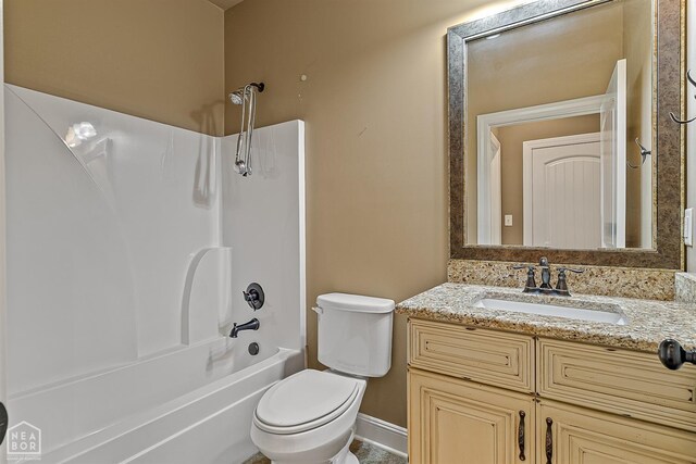 719 Smithfield Dr, Jonesboro, AR 72401 - bathroom with shower / tub combination, vanity, toilet, and baseboards