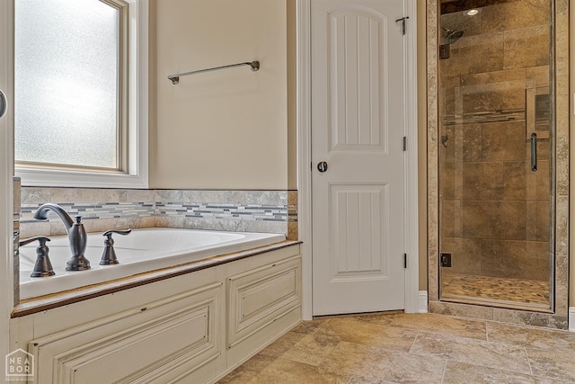 719 Smithfield Dr, Jonesboro, AR 72401 - full bath with a stall shower and stone finish floors