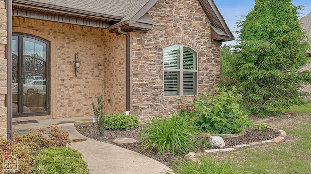 719 Smithfield Dr, Jonesboro, AR 72401 - view of property exterior with stone siding and roof with shingles