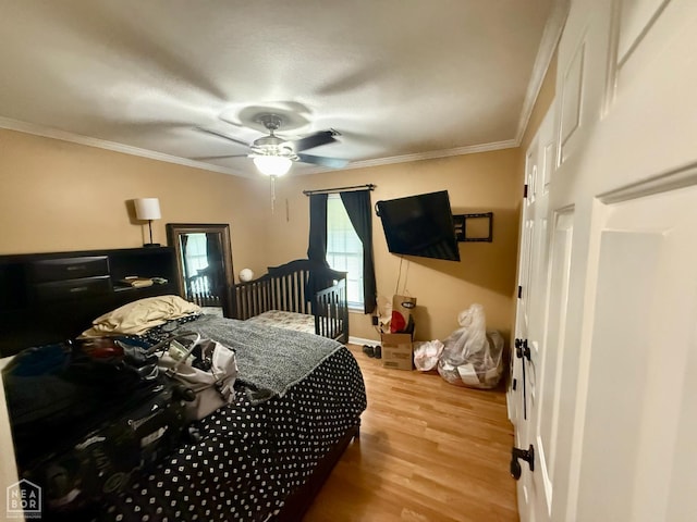 1510 Pratt Cir, Jonesboro, AR 72401 - bedroom featuring wood finished floors, crown molding, and ceiling fan