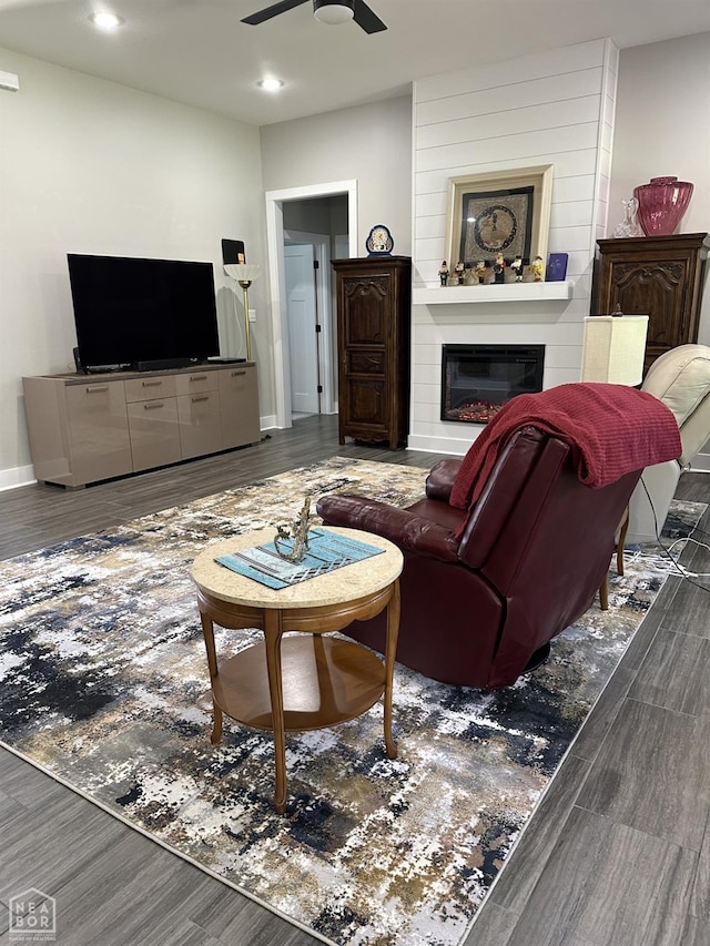 105 Brayden Ln, Brookland, AR 72417 - living area featuring wood finished floors, a ceiling fan, a fireplace, recessed lighting, and baseboards