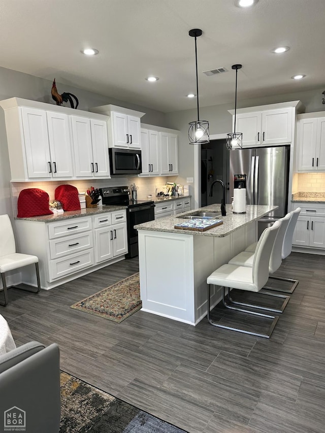 105 Brayden Ln, Brookland, AR 72417 - kitchen with black electric range, recessed lighting, a sink, stainless steel fridge with ice dispenser, and tasteful backsplash