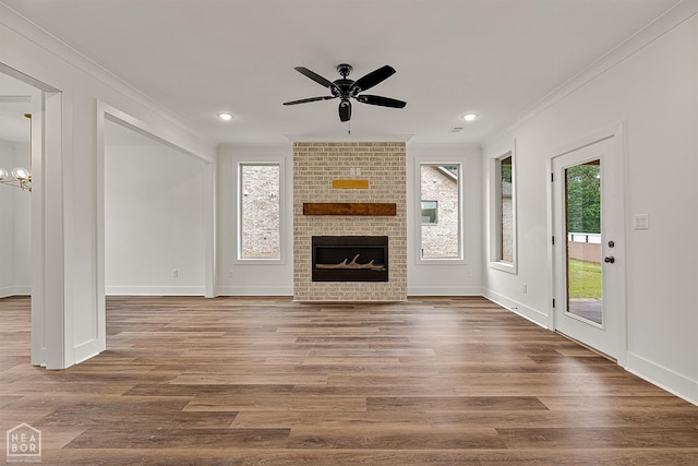 3425 Hudson Ct, Jonesboro, AR 72405 - unfurnished living room featuring ornamental molding, a ceiling fan, wood finished floors, recessed lighting, and a fireplace
