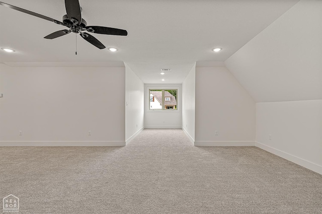 3425 Hudson Ct, Jonesboro, AR 72405 - additional living space featuring light carpet, ceiling fan, recessed lighting, baseboards, and vaulted ceiling
