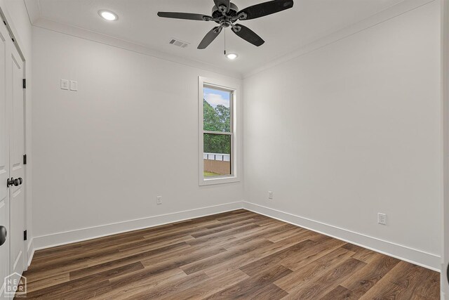 3425 Hudson Ct, Jonesboro, AR 72405 - spare room with crown molding, ceiling fan, dark wood finished floors, recessed lighting, and baseboards